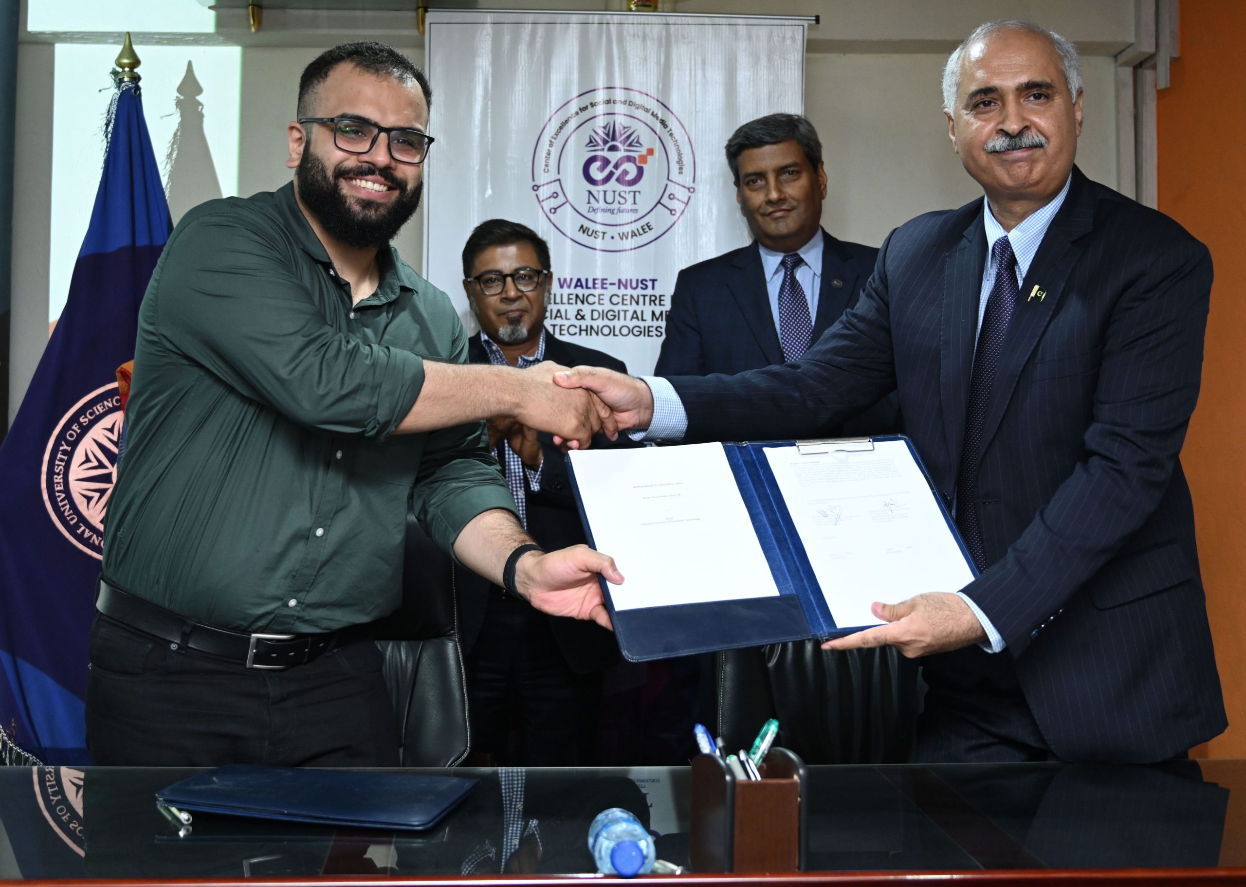 MOU signing with (L-R) Muhammad Ahsan Tahir, Raihan Merchant, TI, Air Vice Marshal Dr Rizwan Riaz SI(M), Dr Muhammad Ajmal Khan, SI(M)